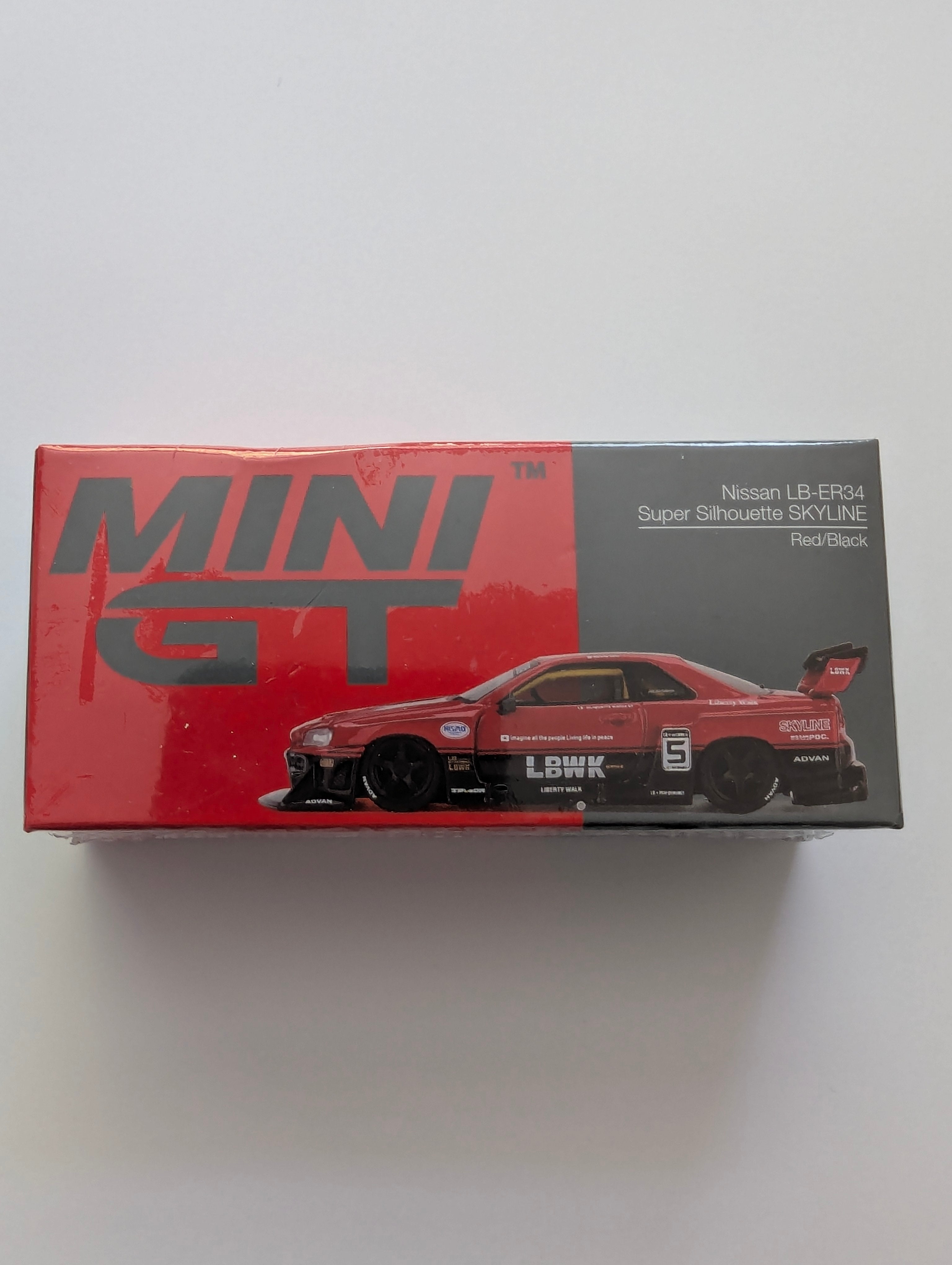 MGT00843-R - Nissan LB-ER34 Super Silhouette Skyline RED/BLACK (RHD) 1:64